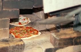 pizzas in oven